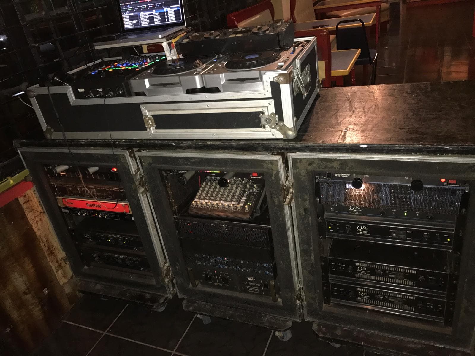 Exodus Nuclear amplifier racks and DJ equipment